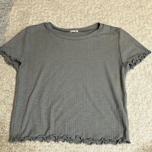 garage, slightly cropped tee shirt